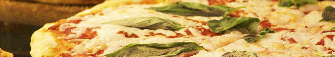 Eating Italian Pizza at Pomodoro Rosso Italian Grill & Pizzeria restaurant in Atlantic Highlands, NJ.